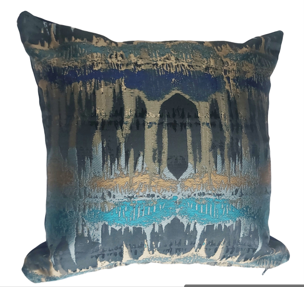 Elements print cushion in teal and bronze