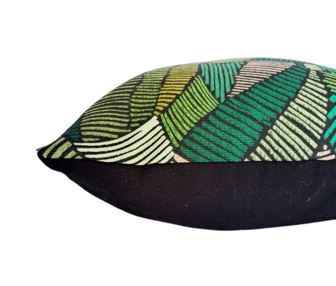 Geometric print cushion in green