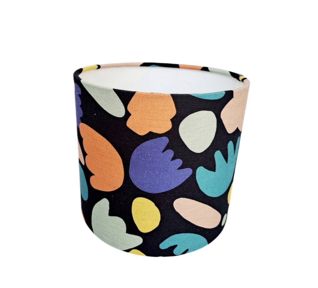 Geometric cutout print lampshade in blue, purple and black