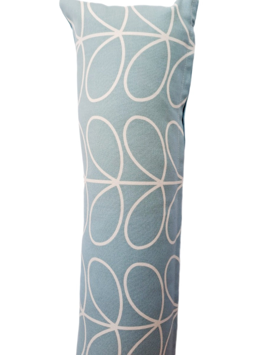 Draught excluder in linear stem print duck egg