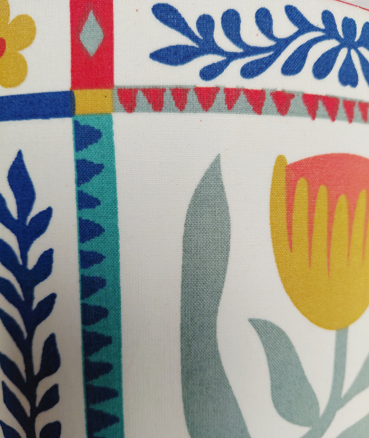 Scandi style tile print lampshade in red, blue and green. Kitsch folk art flower print shade