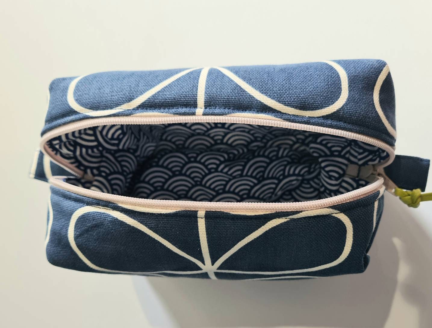Linear stem print cosmetic bag in dark blue
