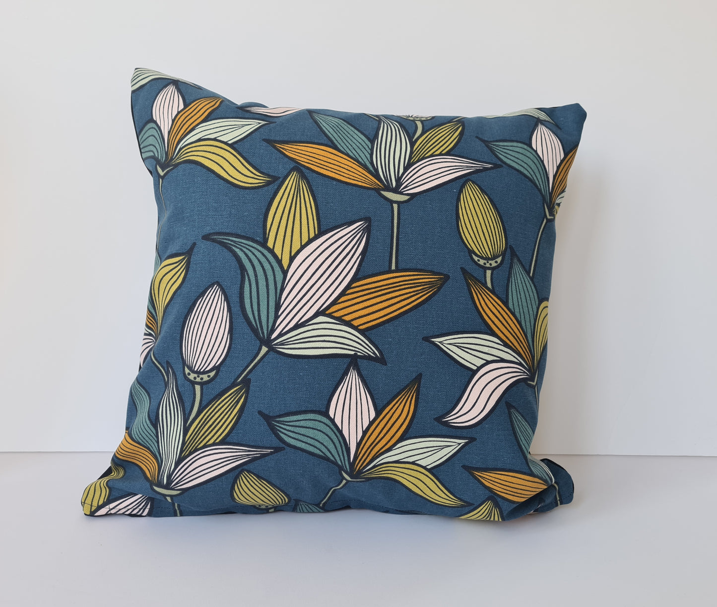 Tulip print cushion in blue and orange