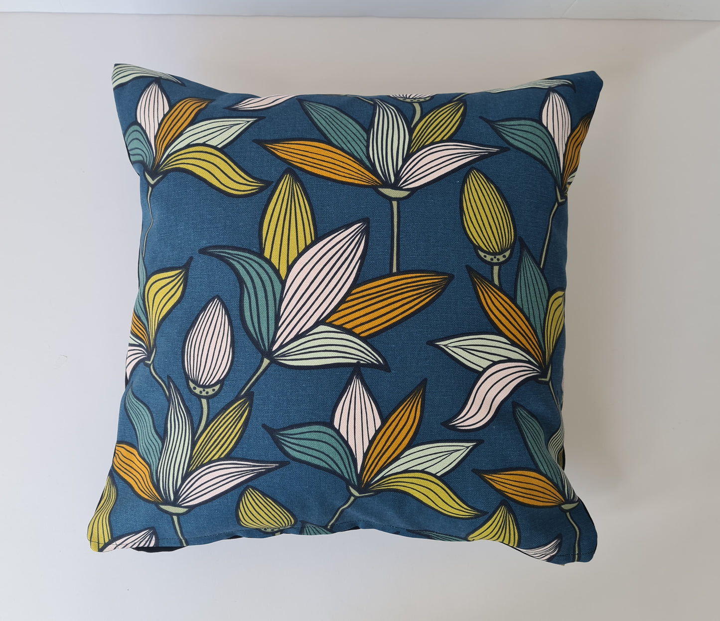 Tulip print cushion in blue and orange