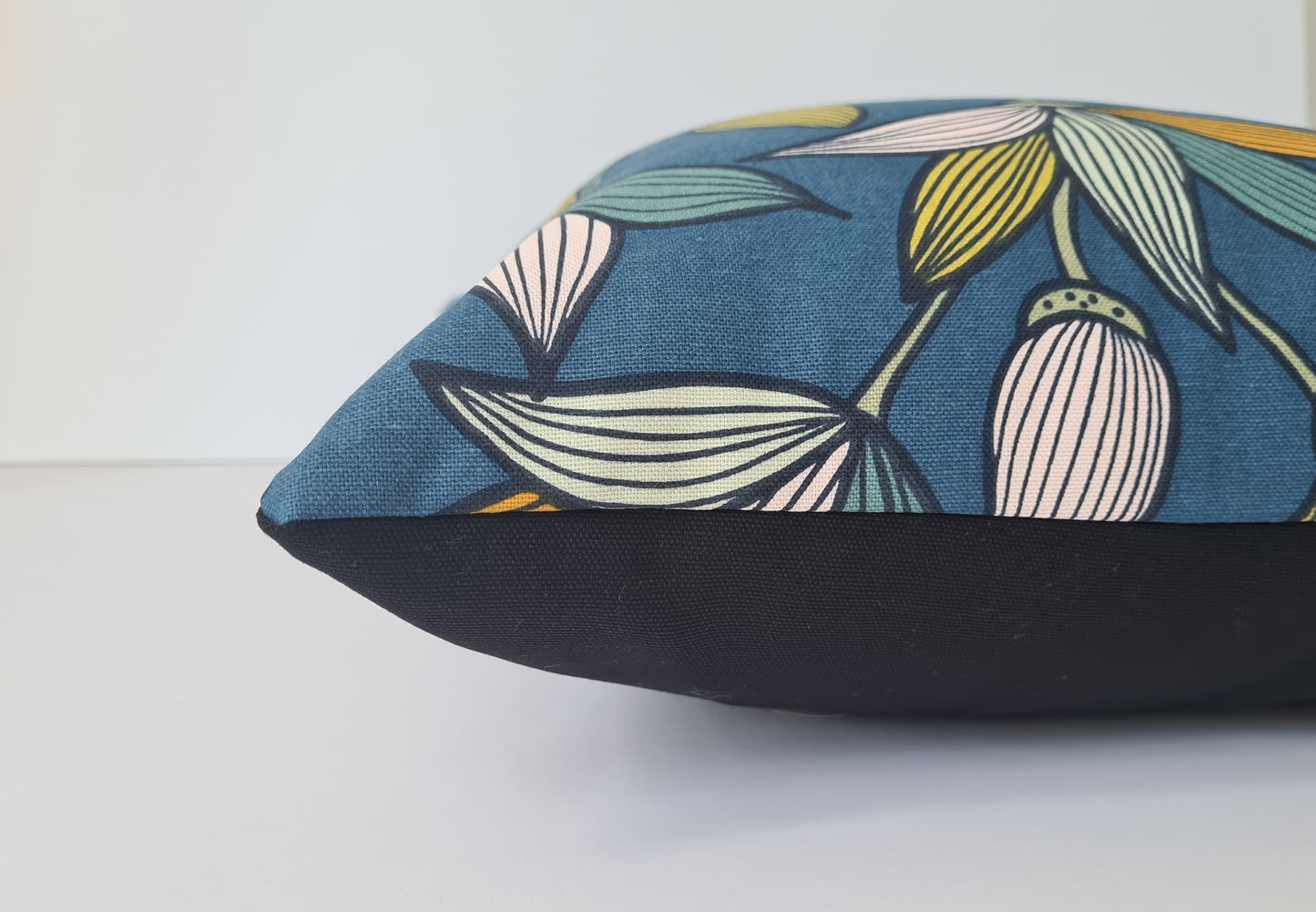 Tulip print cushion in blue and orange