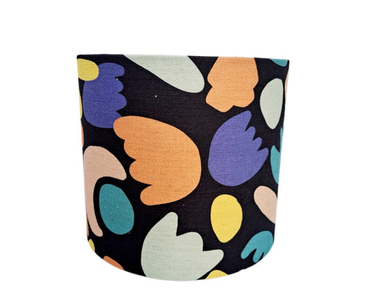 Geometric cutout print lampshade in blue, purple and black