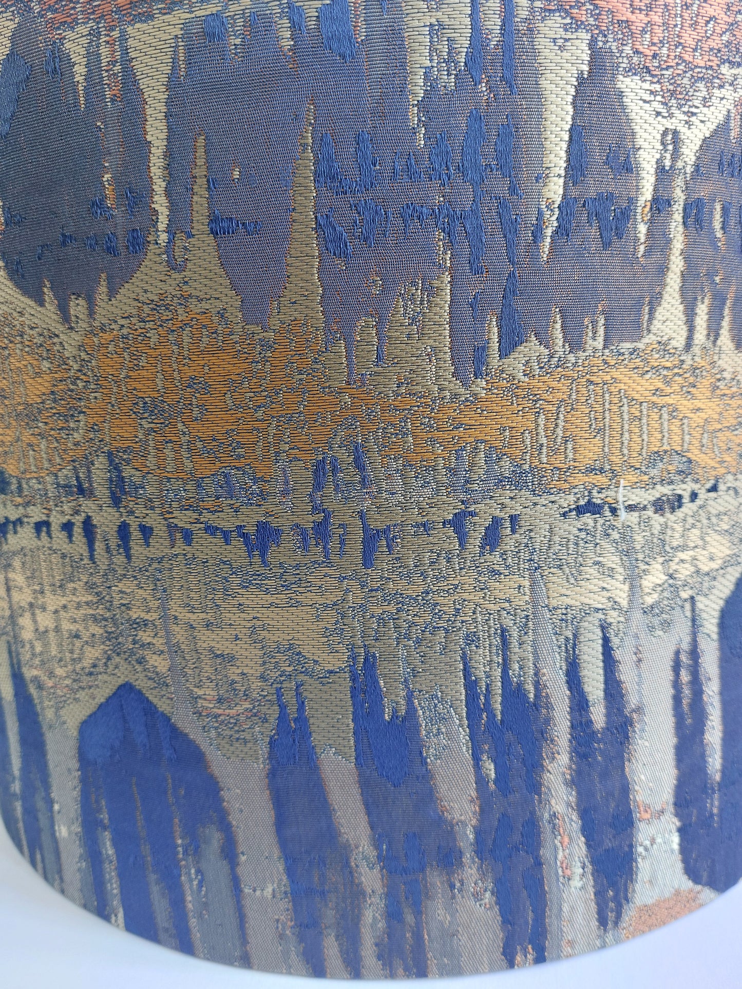 Elements print in blue and cooper with mirror gold lining