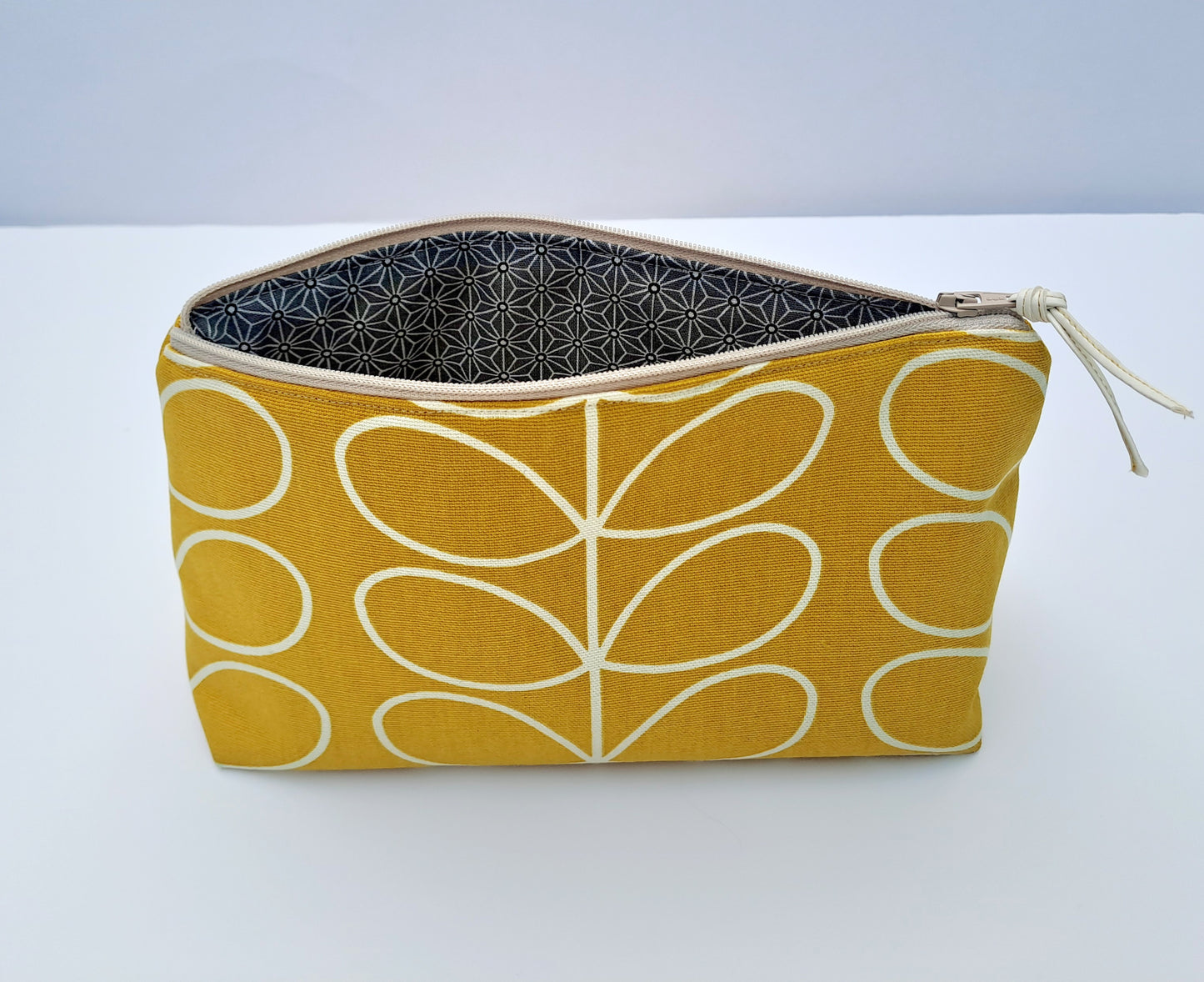 Linear stem print large cosmetic bag in mustard