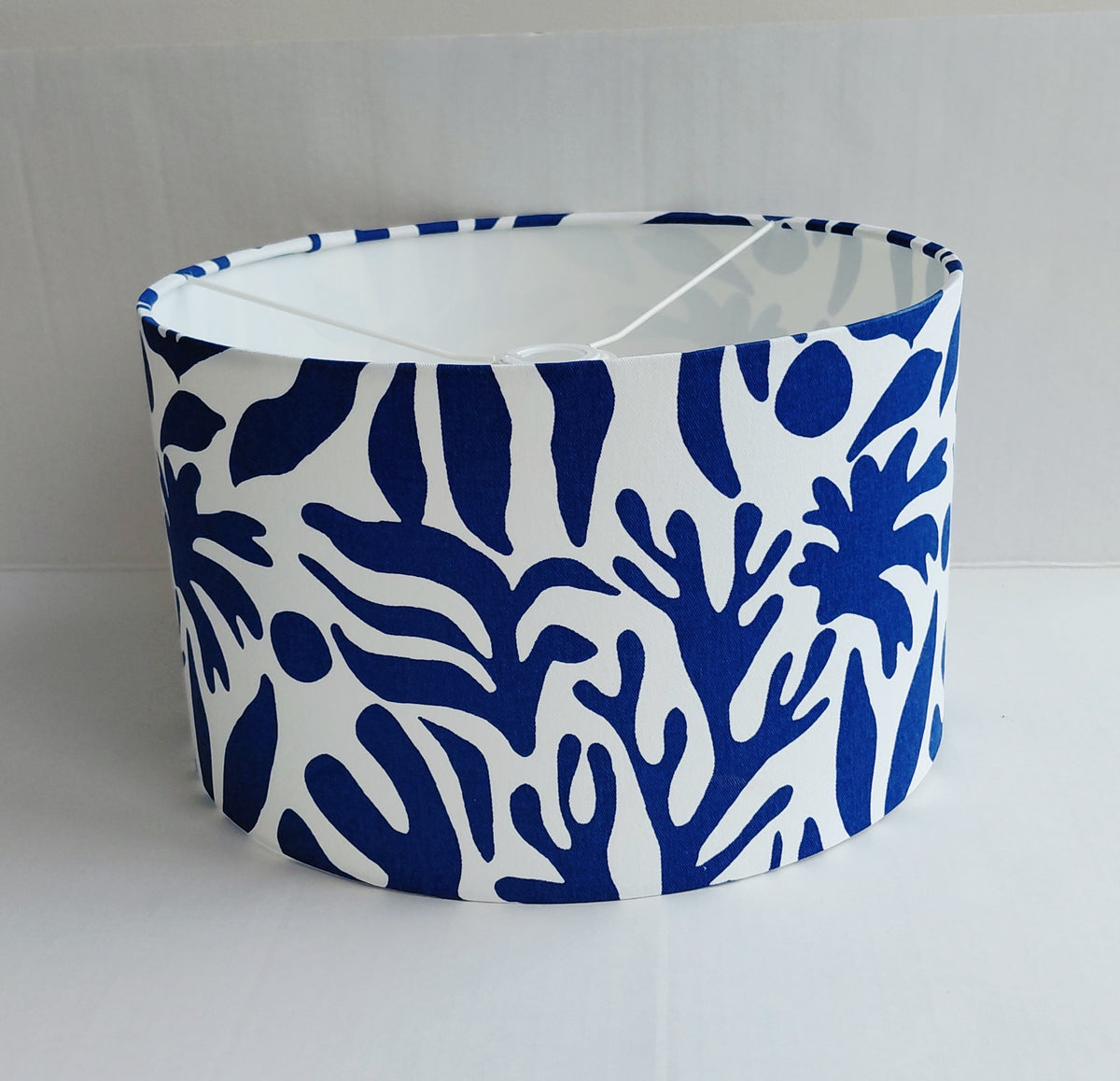 Blue seaweed print drum lampshade in blue and white. Coral reef print pendant