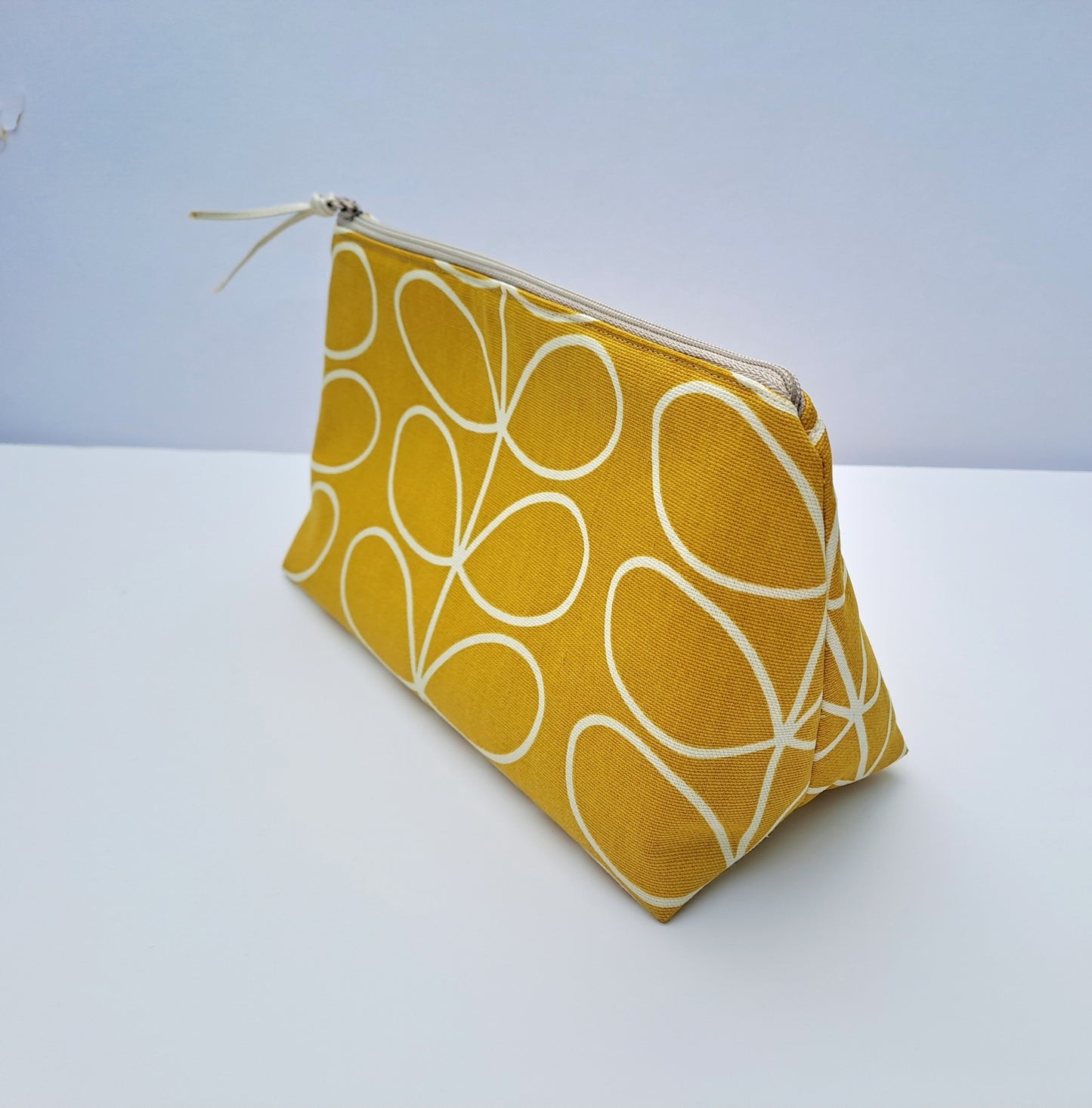 Linear stem print large cosmetic bag in mustard