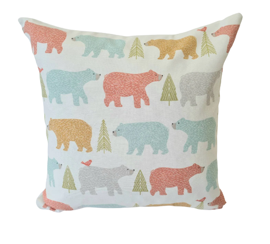 Scandi bear and fir tree print kids cushion in blue, orange and grey