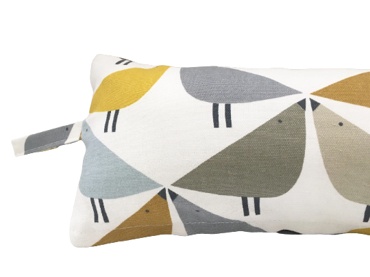 Love bird print draught excluder cushion in dandelion, butterscotch and pebble