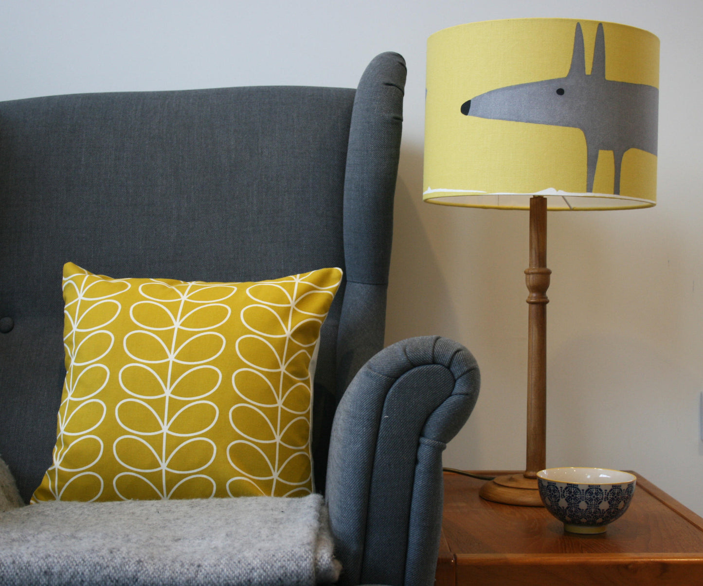 Linear stem print cushion in mustard