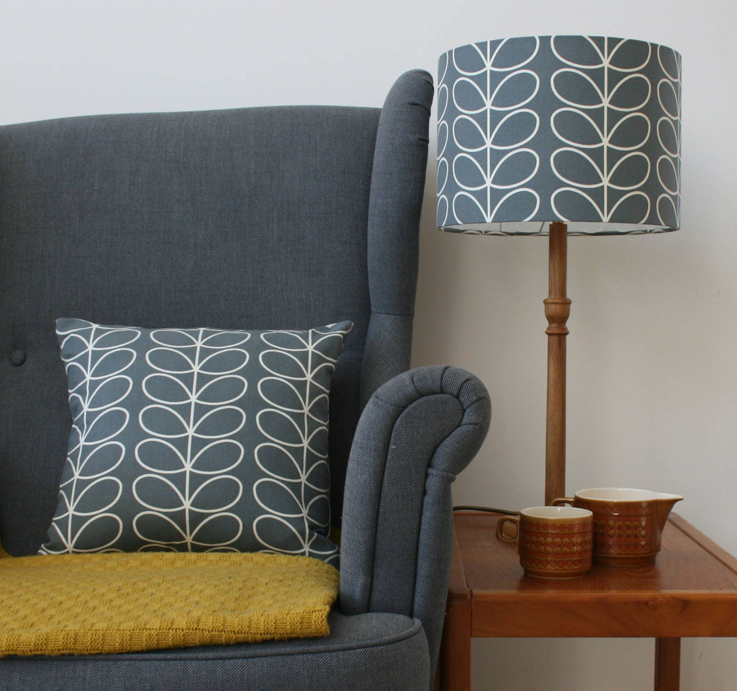 Linear stem print cushion in grey