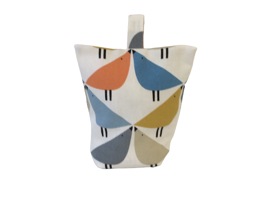 Love bird print door stop in orange, blue and grey