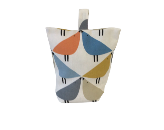 Love bird print door stop in orange, blue and grey