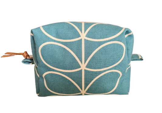 Linear stem print cosmetic bag in teal