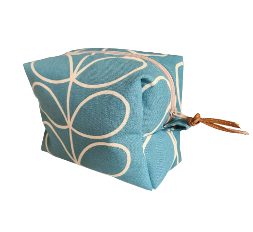 Linear stem print cosmetic bag in teal